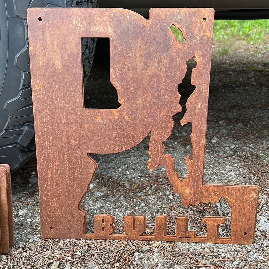 Small Rusted Metal PL Built Sign